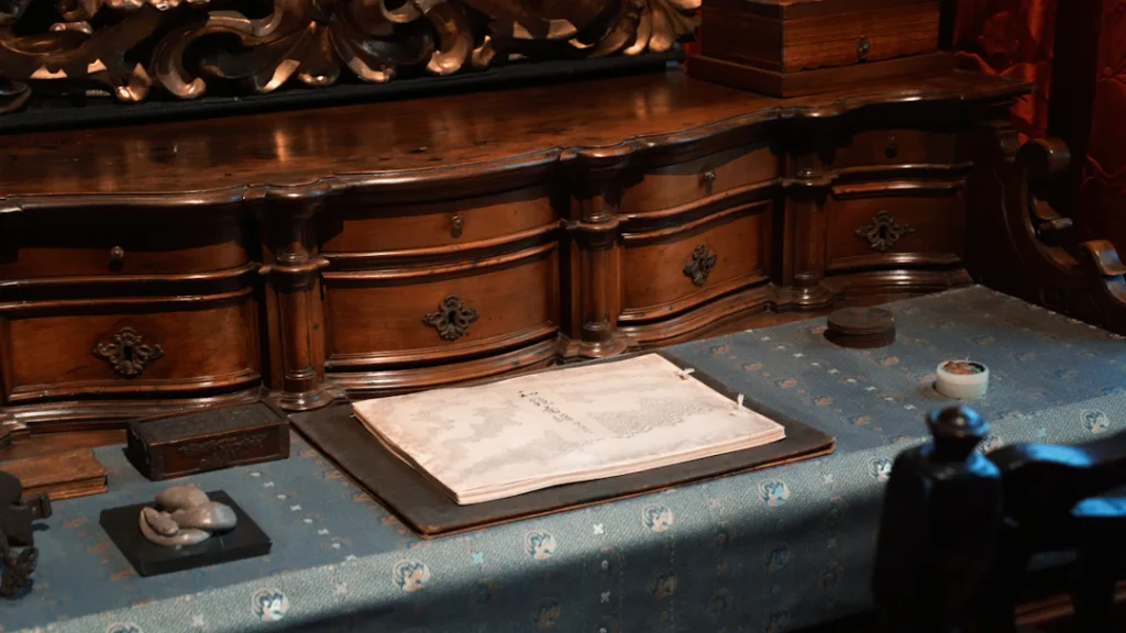 Writing desk with papers and writing tools