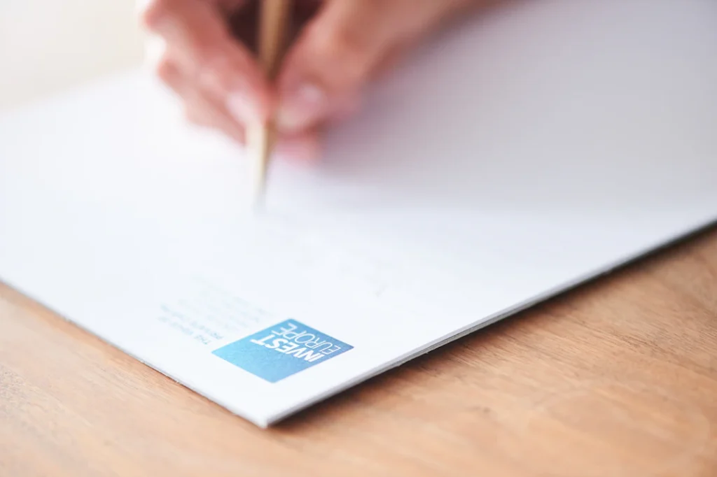 A person writing on a document